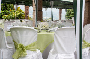 gorgeous wedding chair and table setting for fine dining at outdoors summer wedding