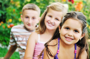 group of happy child outdoor having fun at company picnic
